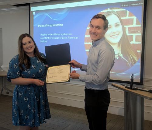 Sydney Marshall receives certificate